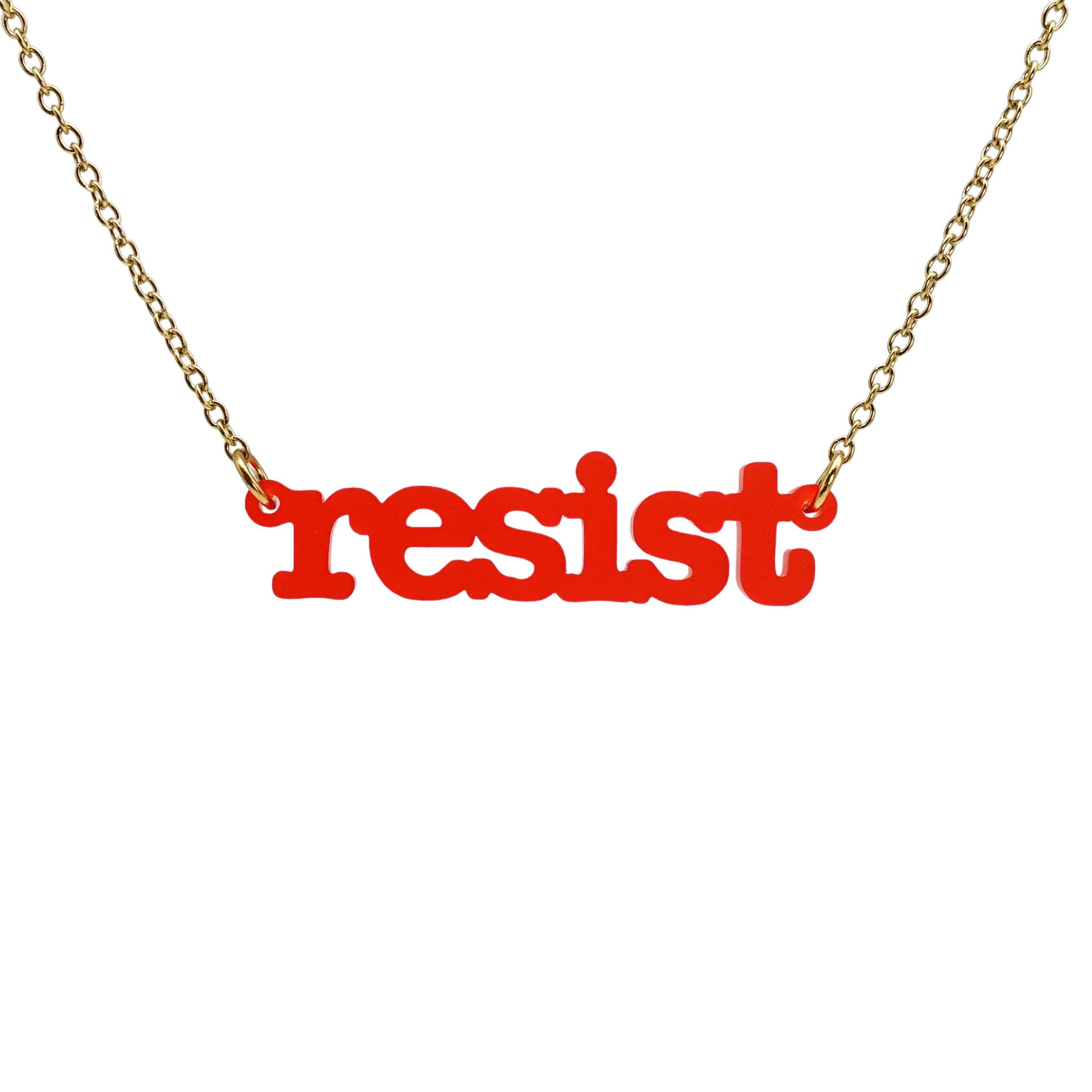 Typewriter Resist necklace in chilli frost shown hanging on a gold plated chain against a white background. 
