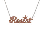 Resist necklace in pink fizz glitter, shown hanging against a white background. 