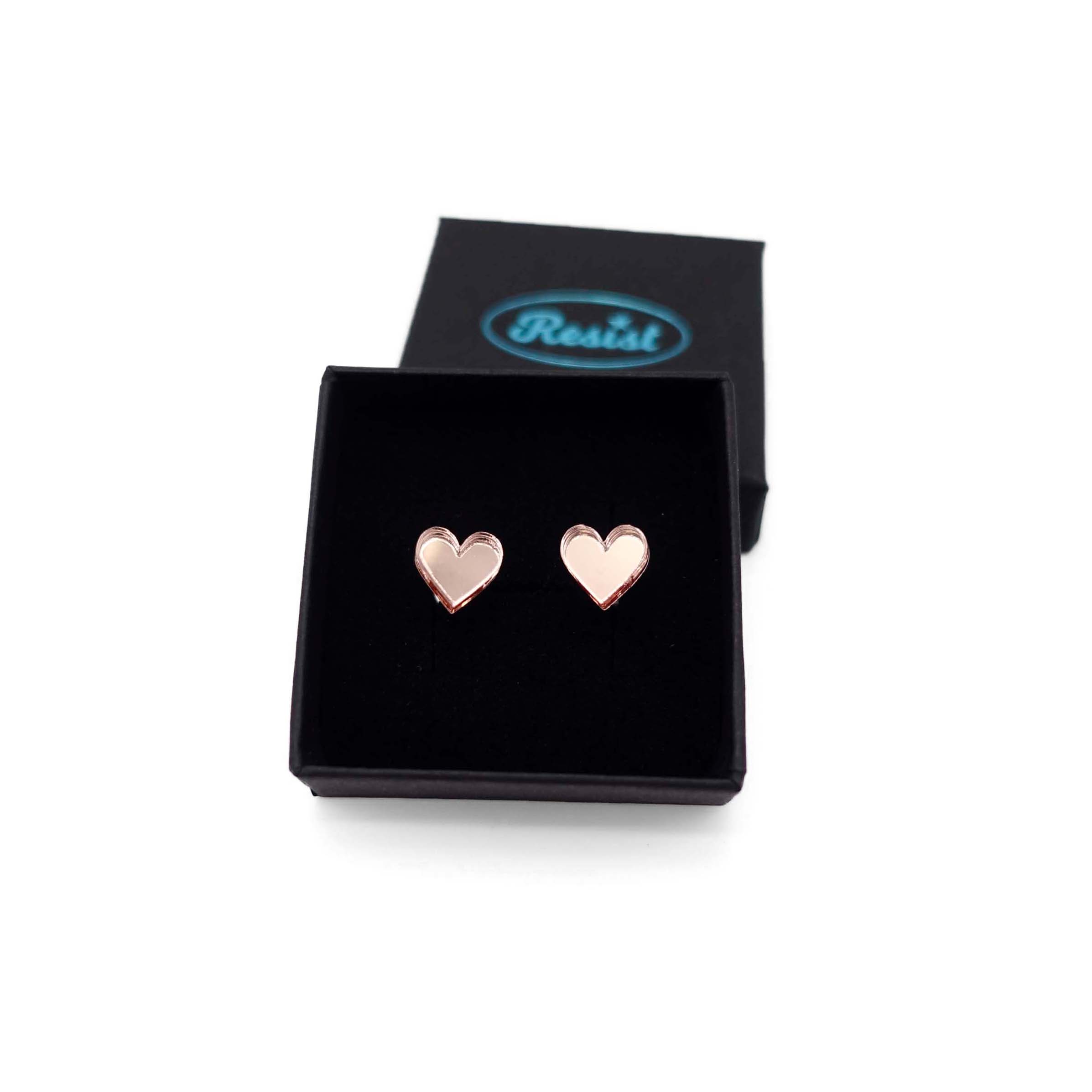 Rose gold mirror small heart earrings, shown in a small Wear and Resist gift box. 