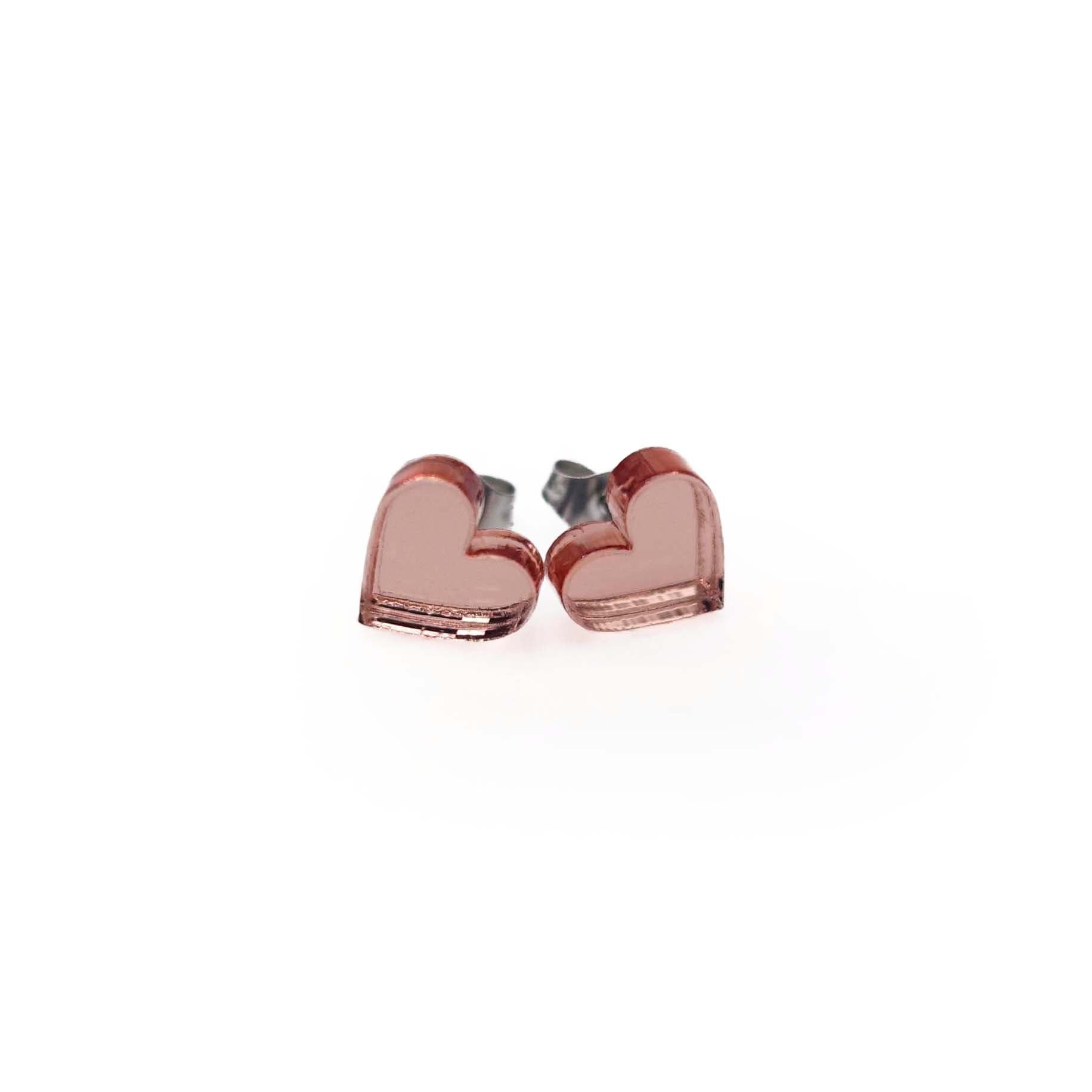 Small heart earrings in rose gold mirror, shown against a white background.  