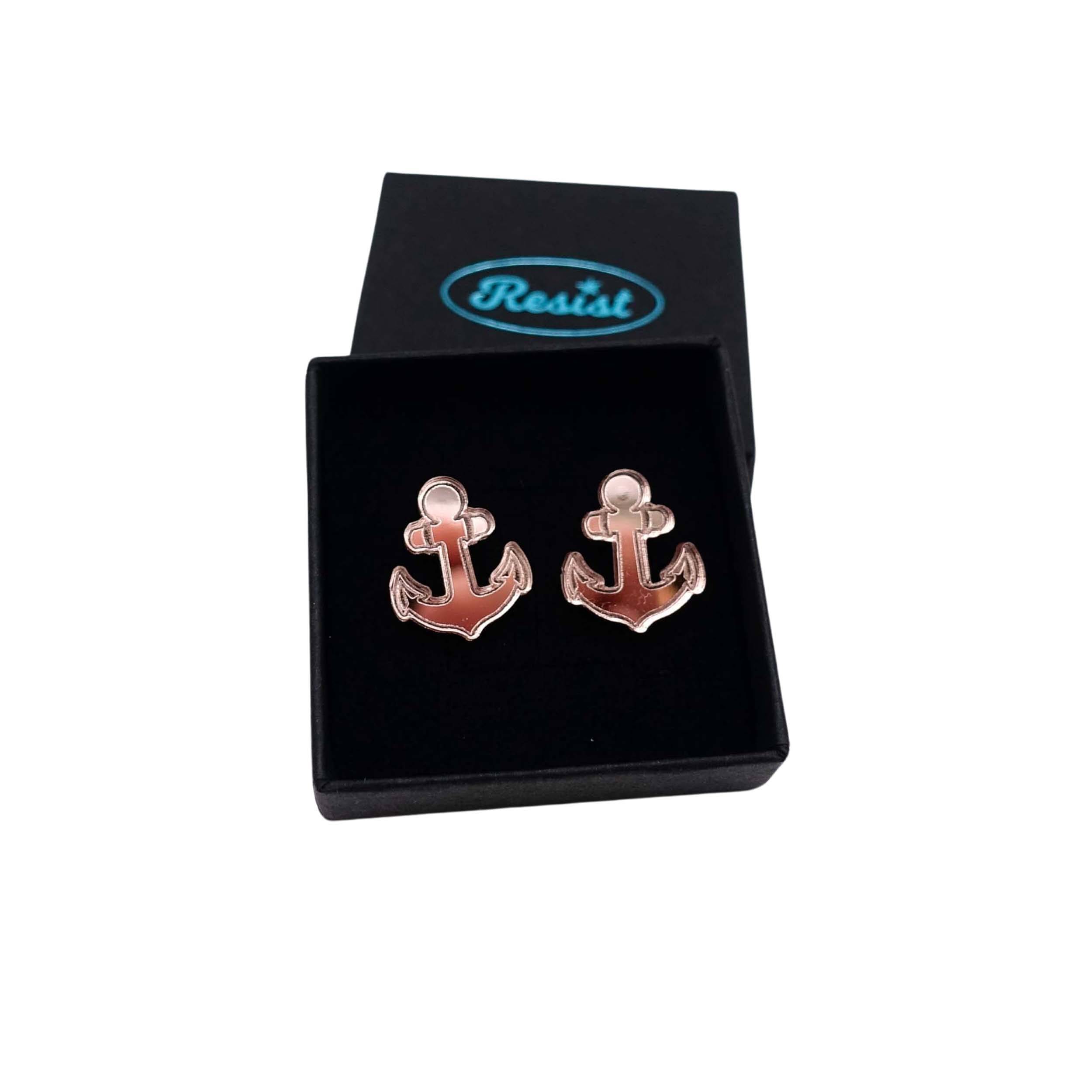Rose gold mirror little anchor earrings shown in a Wear and Resist gift box. 