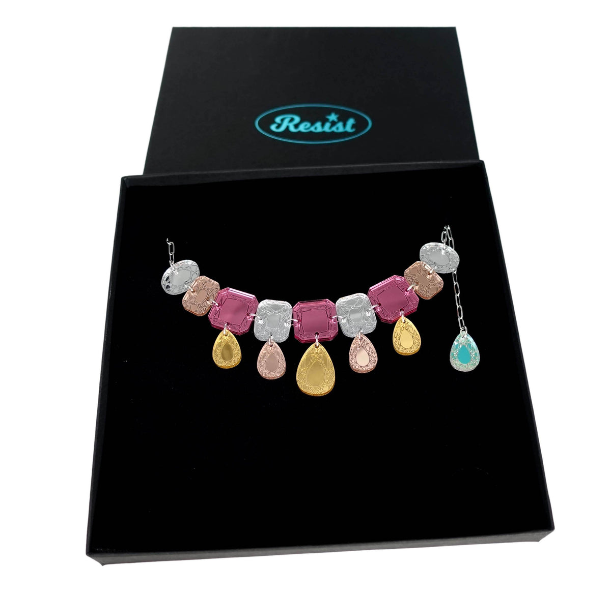 Jewel necklace in rosey gold shown in a large Wear & Resist gift box. 