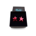 Ruby mirror funky Resist star earrings shown in a Wear and Resist gift box. 