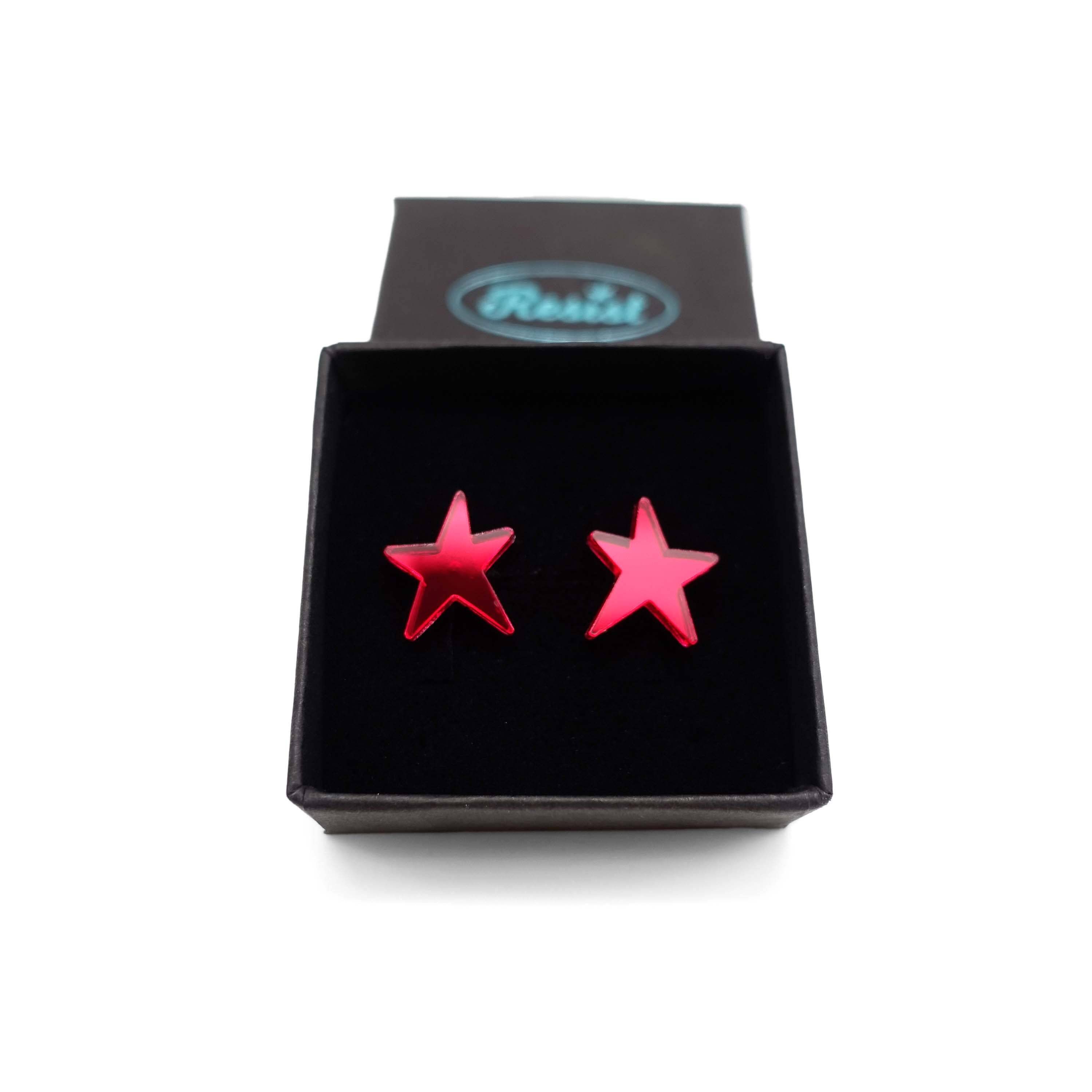 Ruby mirror funky Resist star earrings shown in a Wear and Resist gift box. 