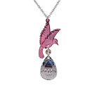 An acrylic pendant necklace with a pink bird holding a silver 'jewel' that says 'F*ck Yeah'.
