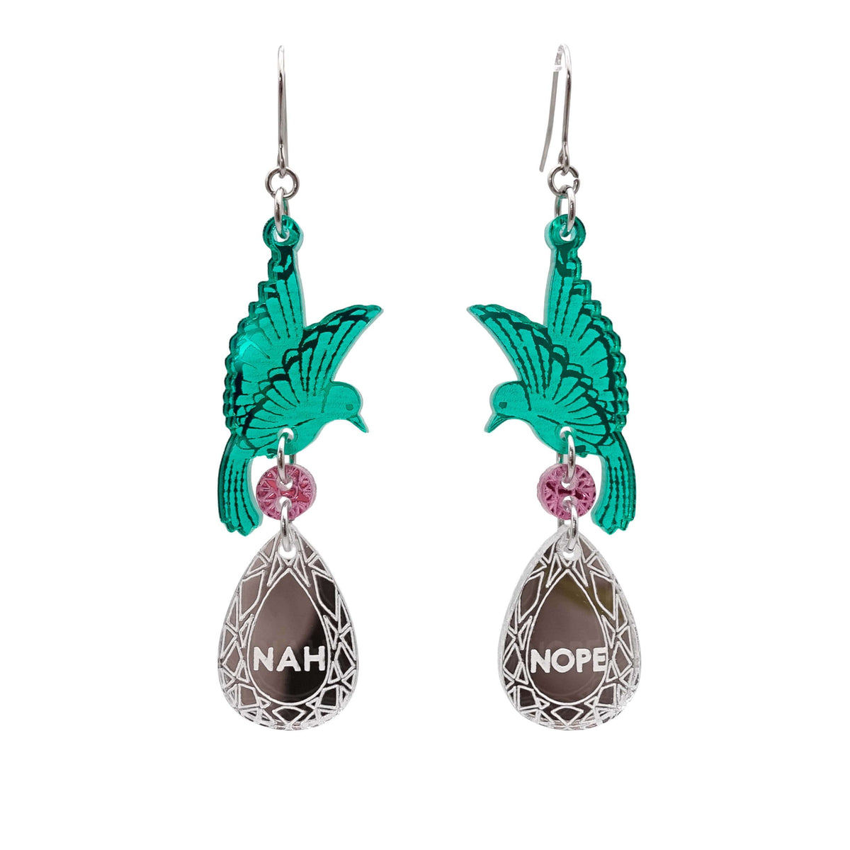 A pair of acrylic earrings with green birds holding silver 'jewels' that say 'Nah' and 'Nope'.