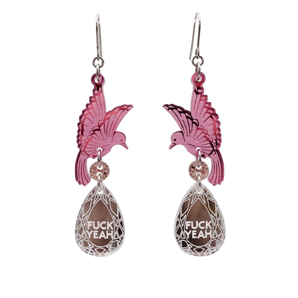 A pair of acrylic earrings with pink birds holding silver 'jewels' that say 'F*ck Yeah'.