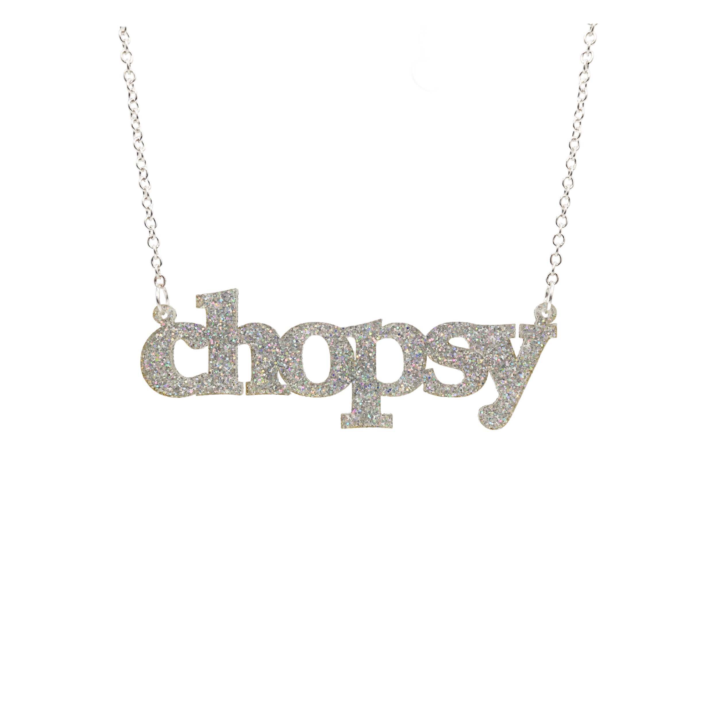 Silver glitter Chopsy necklace shown hanging against a white backround. 