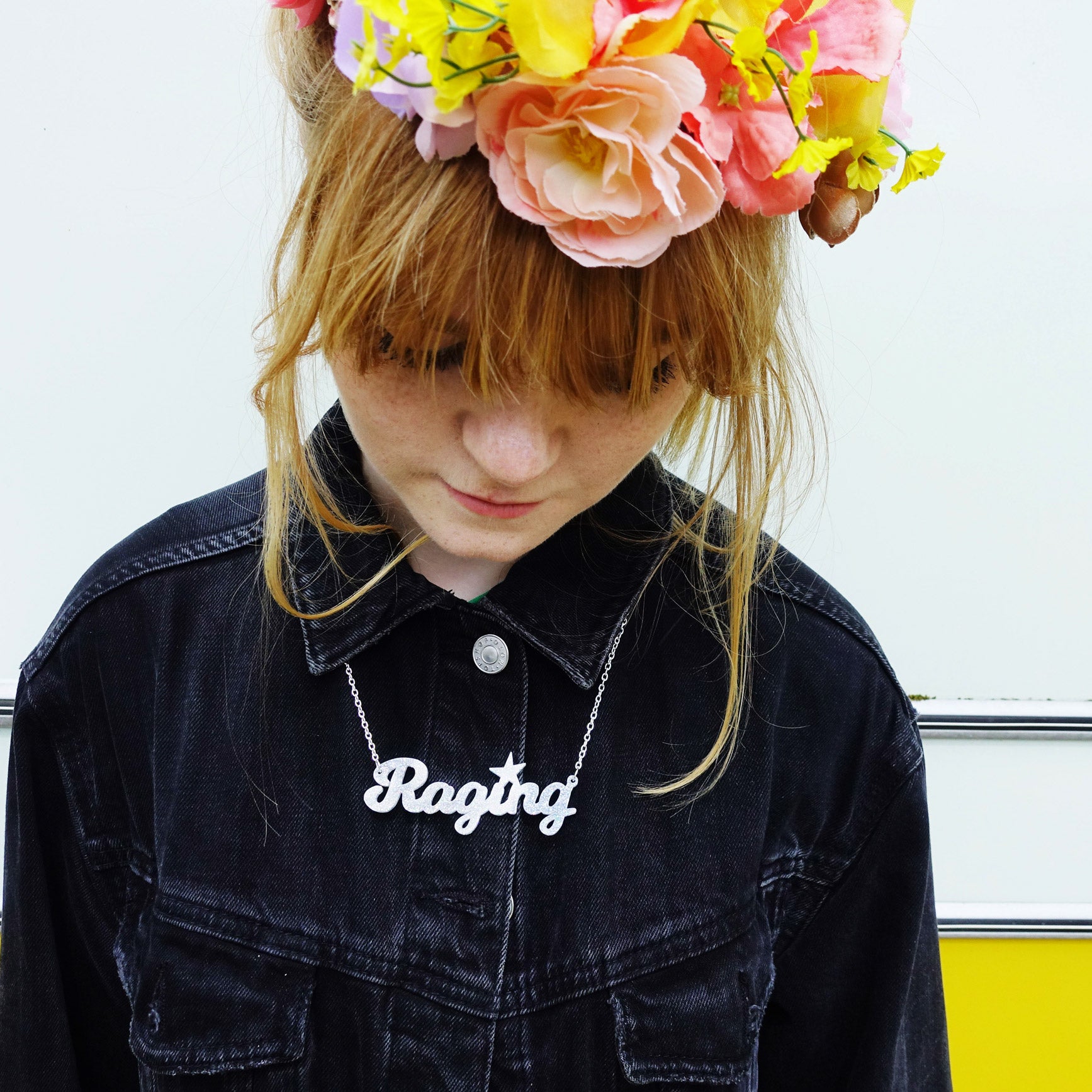 model wears holographic silver glitter raging necklace