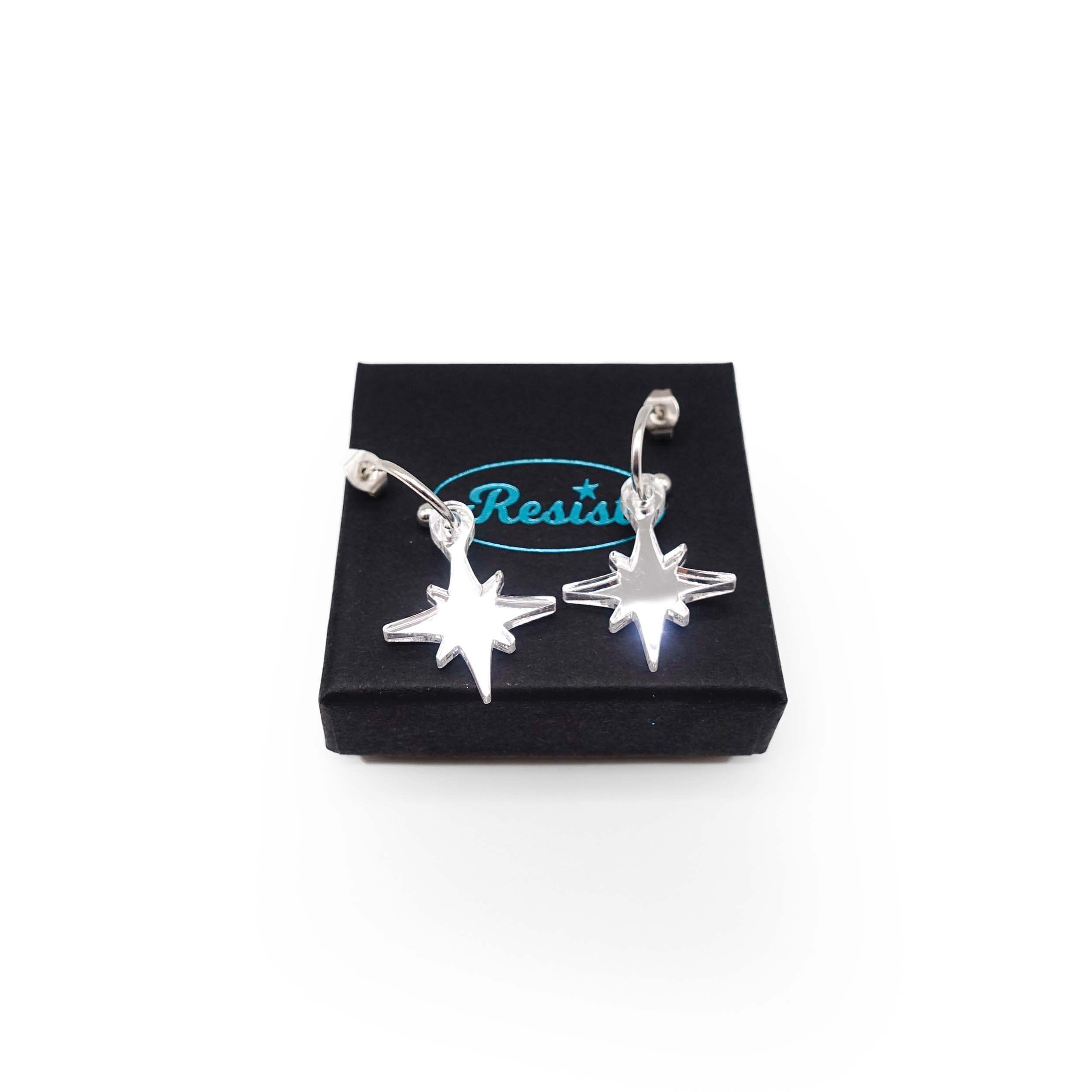 Silver mirror limited edition Festive Vintage Star earrings, shown on a Wear and Resist gift box.  