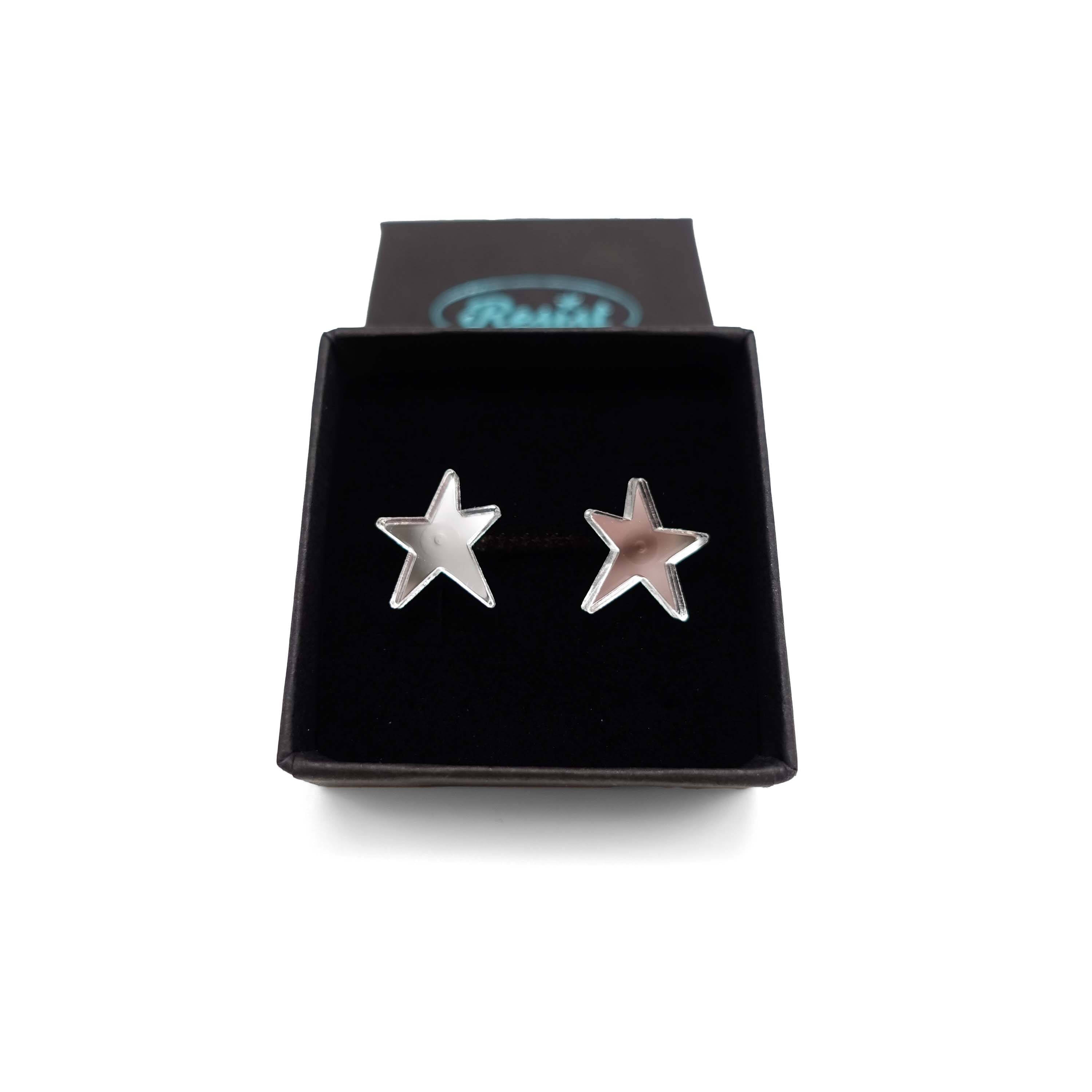 Silver mirror funky Resist star earrings shown in a Wear and Resist gift box. 