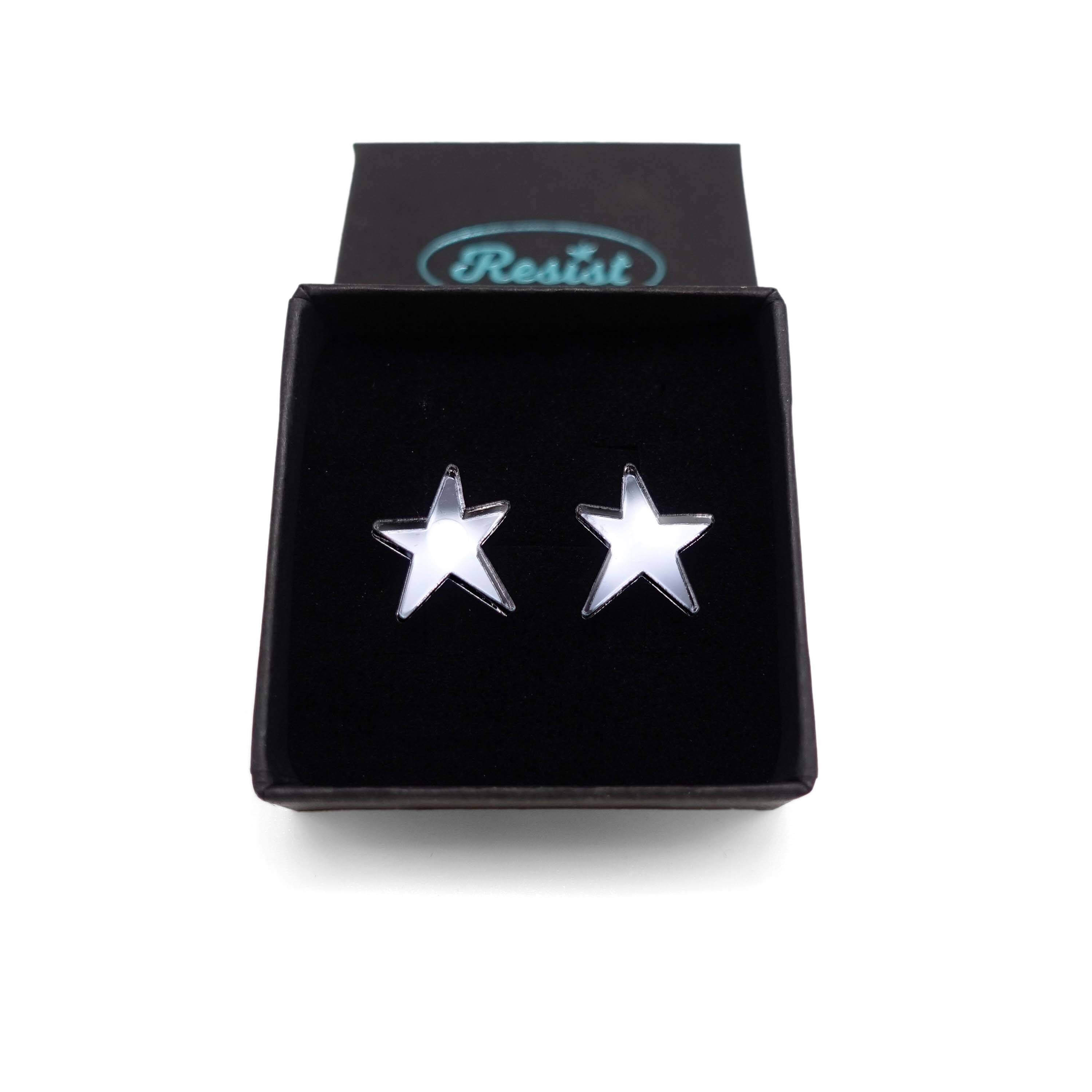 Slate mirror funky Resist star earrings shown in a Wear and Resist gift box. 
