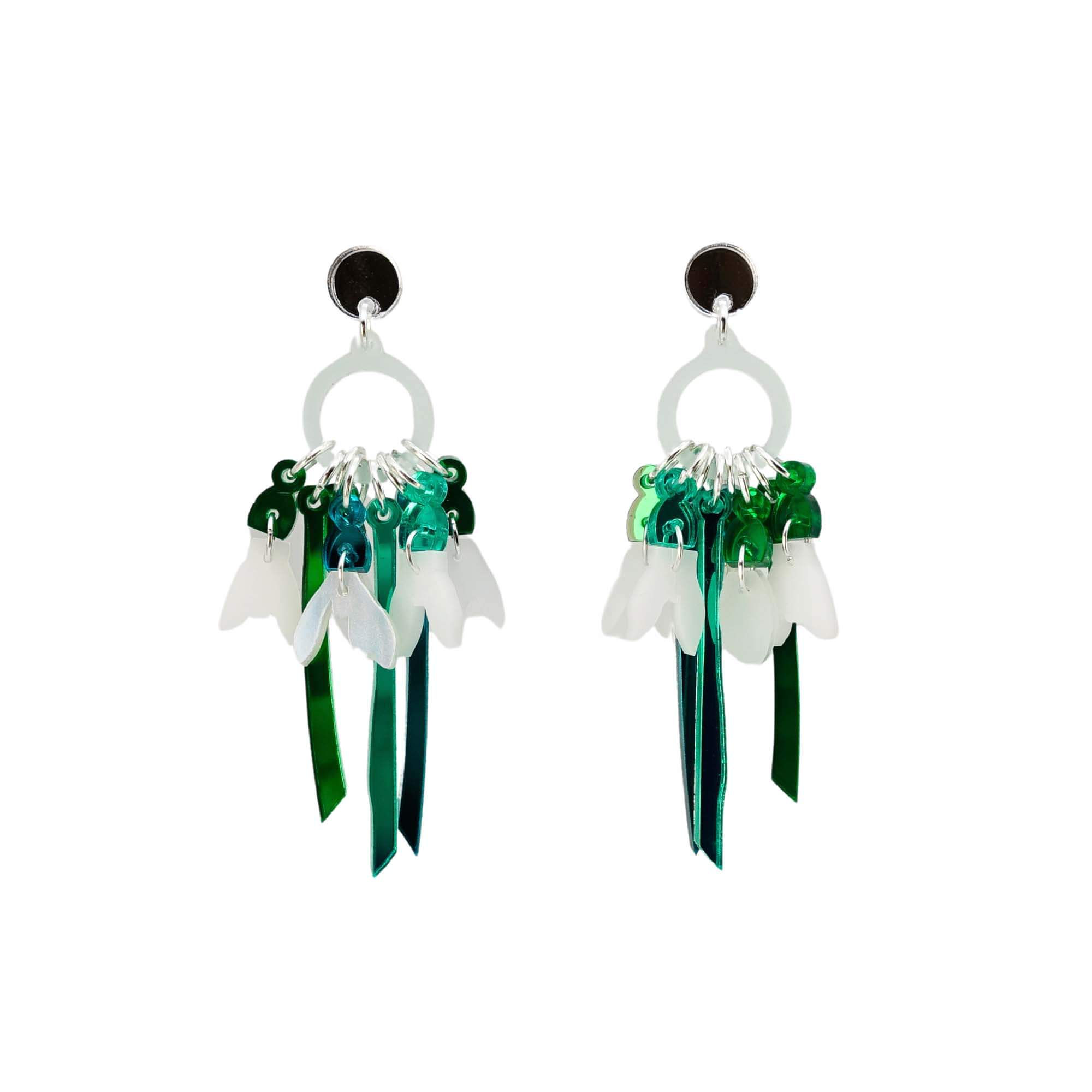 Snowdrop earrings shown hanging against a white background. 