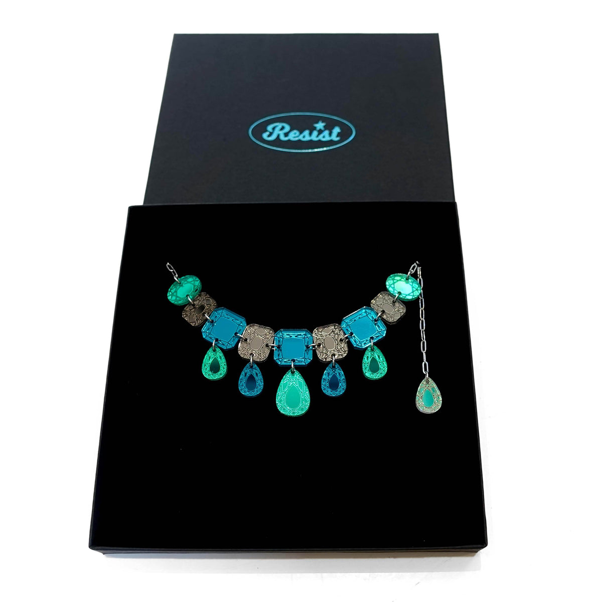Jewel necklace in teal epoque shown in a large Wear & Resist gift box. 