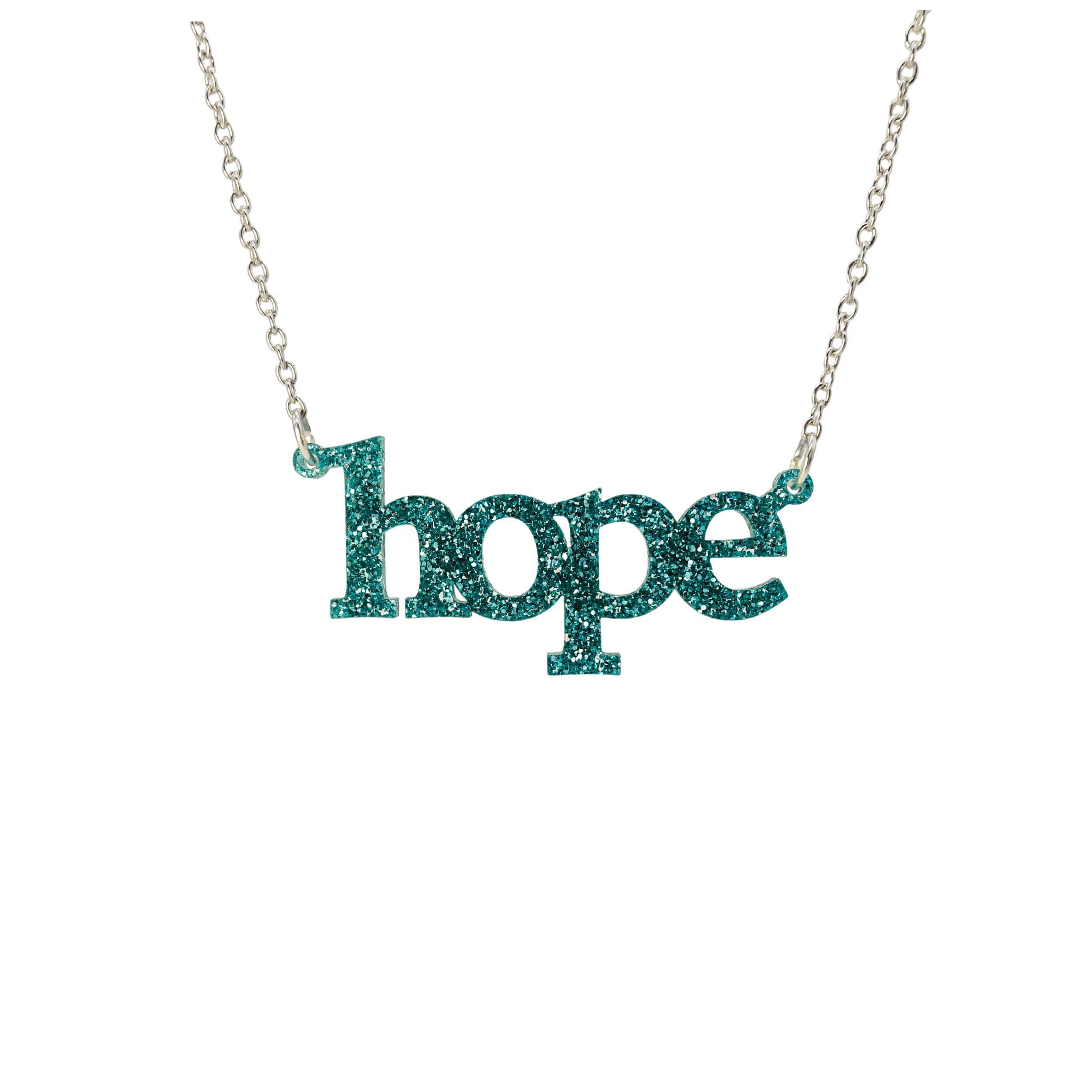 Hope necklace in teal glitter shown on a silver chain hanging on a white background. 