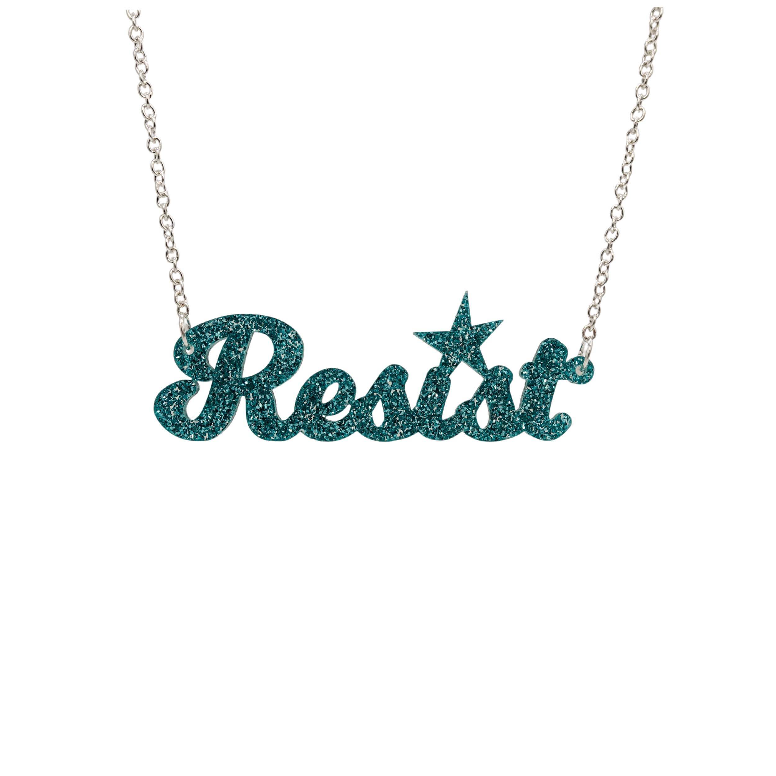 Teal glitter script Resist necklace shown hanging against a white background. 