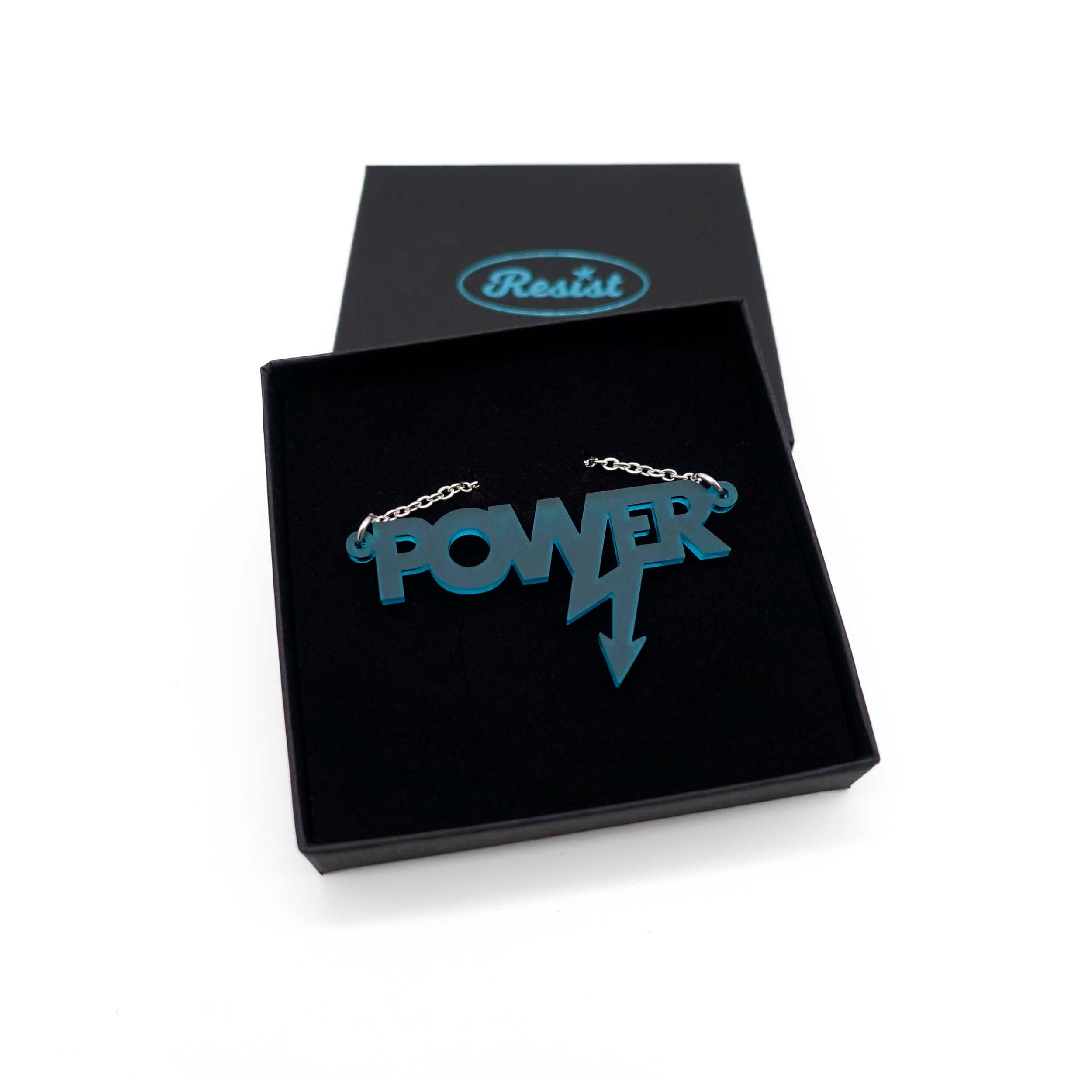 Mini power necklace in teal frost shown in a Wear and Resist gift box. 