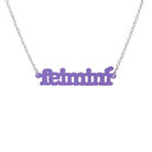 Irish Gaelic Feiminí necklace in violet frost shown hanging against a white background. 