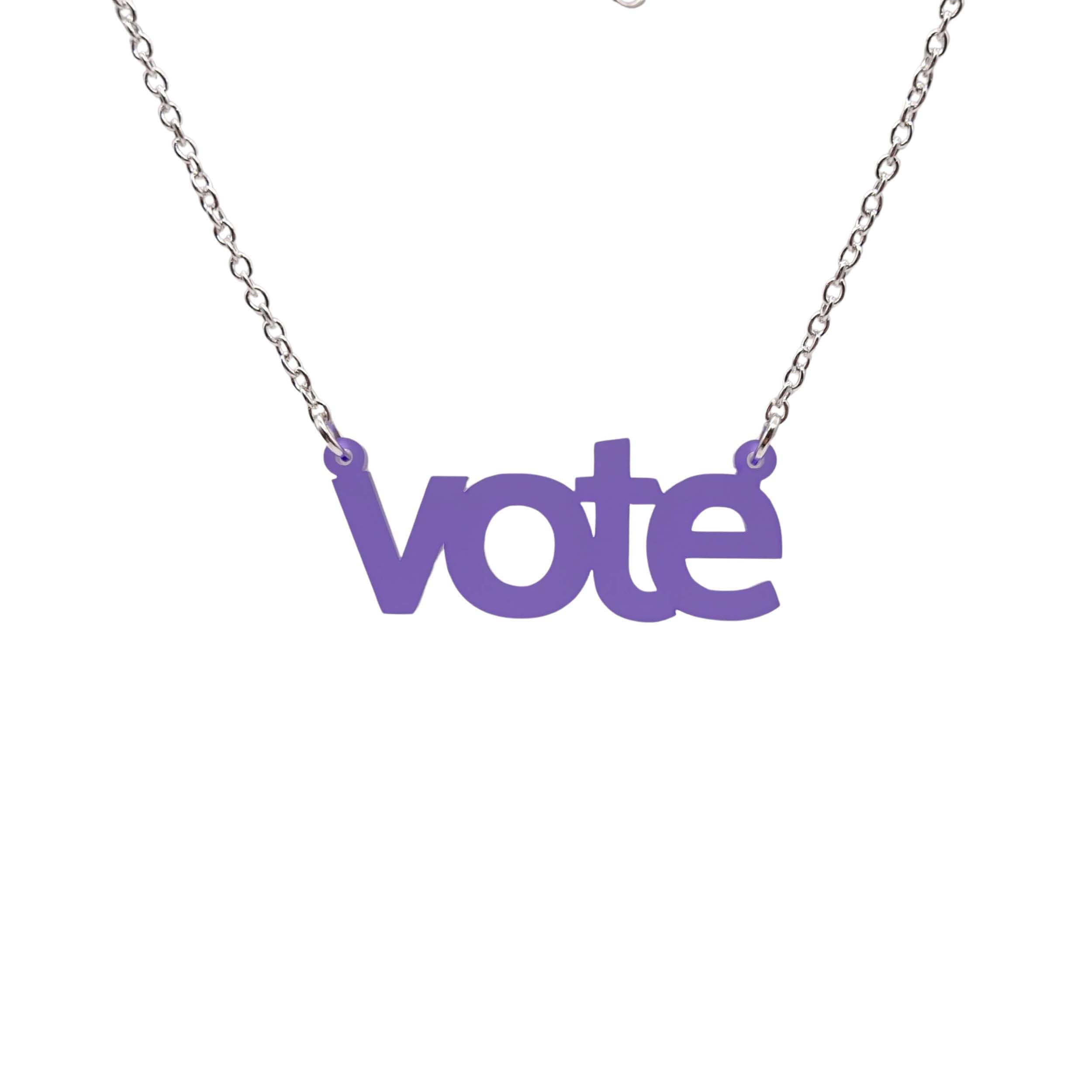 Vote necklace in violet frost shown hanging against a white background. 