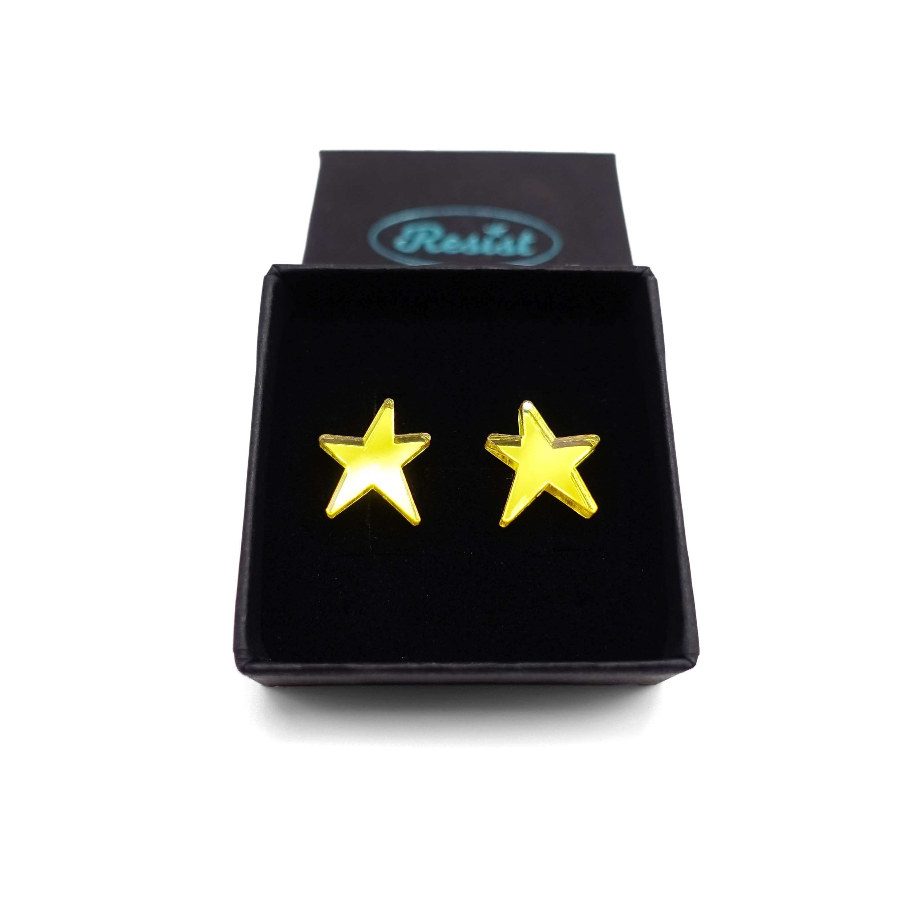 Yellow mirror funky Resist star earrings shown in a Wear and Resist gift box. 