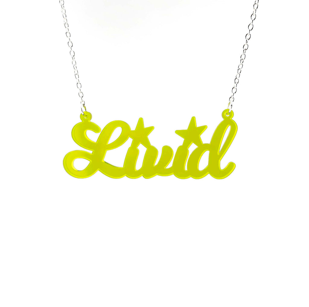 Livid necklace in citrus yellow shown hanging on a white background. 