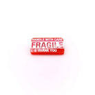 FRAGILE Handle With Care brooch designed by Sarah Day for Wear and Resist. £2 goes to Women for Refugee Women. 