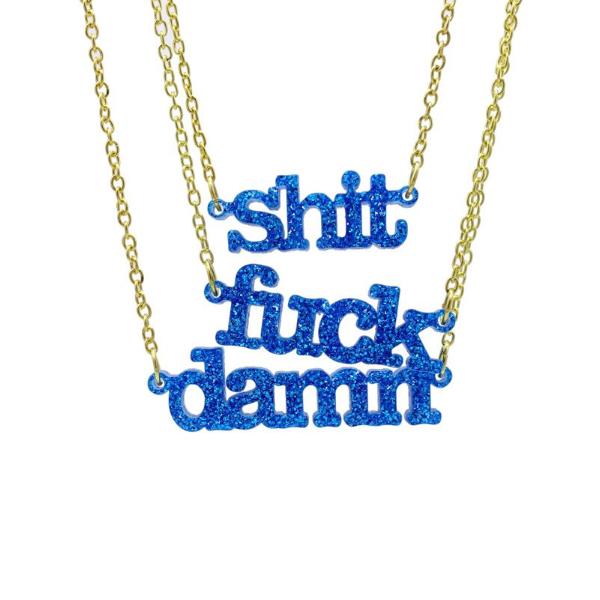 Three necklaces in blue glitter one saying shit one saying fuck and one saying damn shit fuck damn necklaces