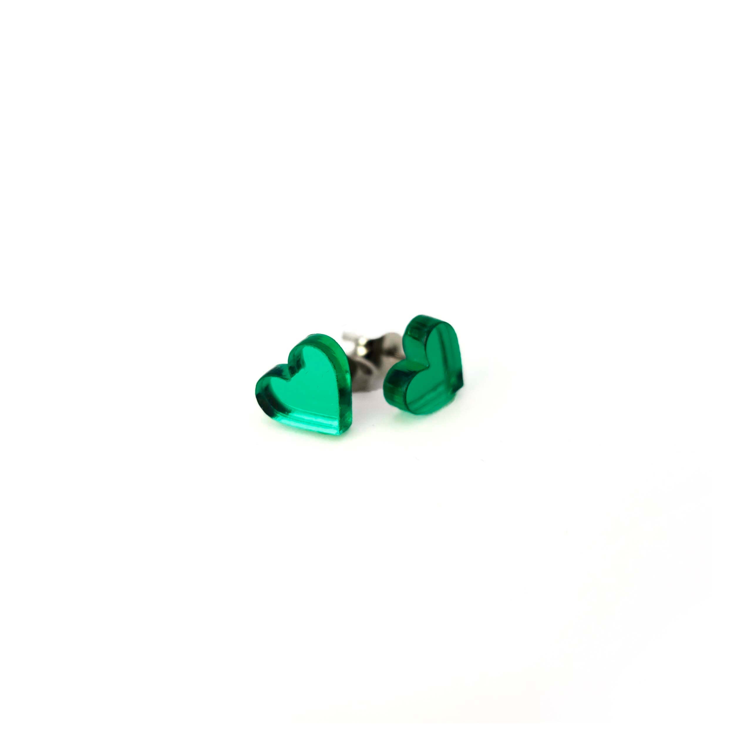 Electric green heart earrings shown on a white background. 