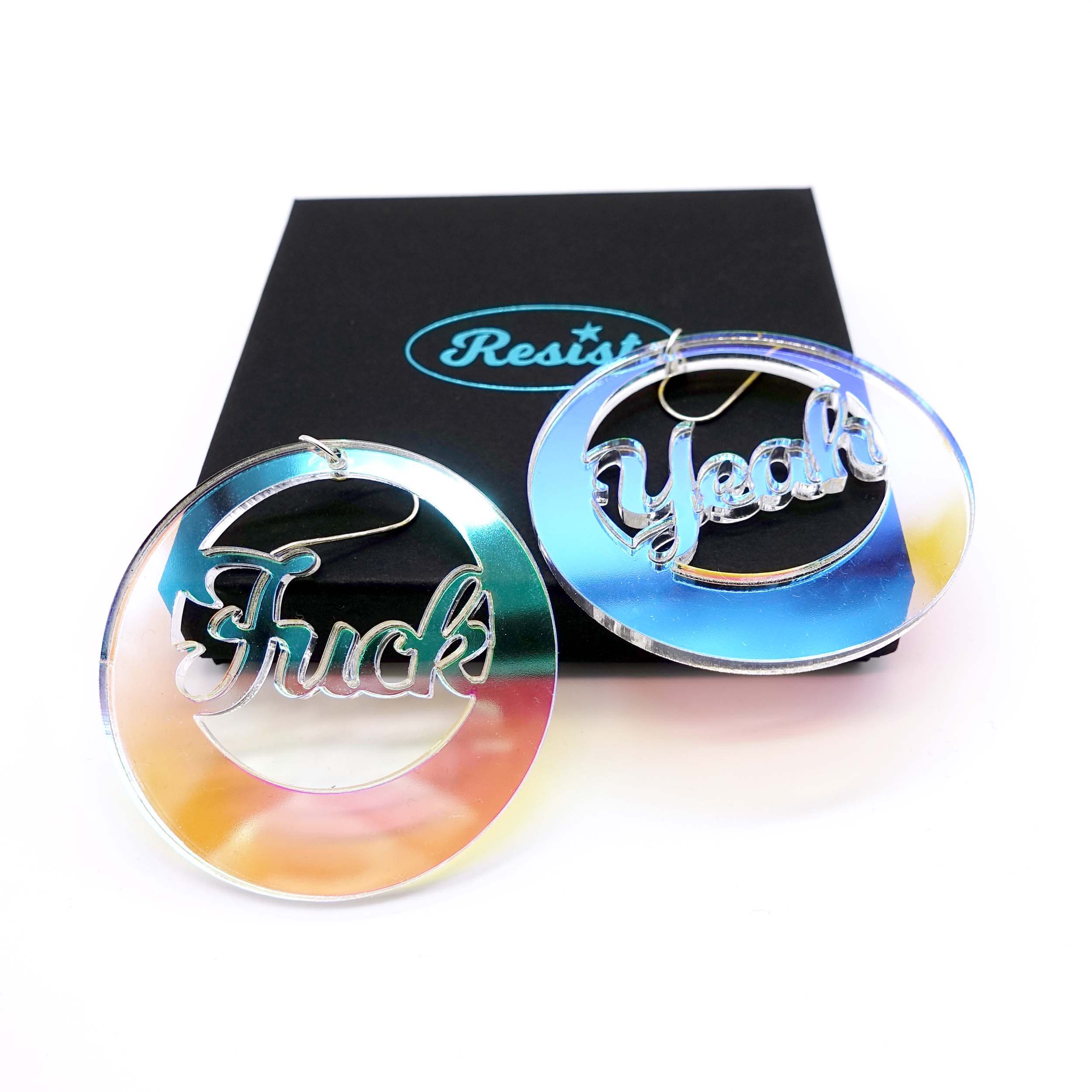 F*ck Yeah iridescent hoop earrings shown with a Wear and Resist gift box. 