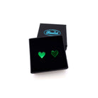 Envy green mirror tiny heart stud earrings shown in a Wear and Resist gift box. 