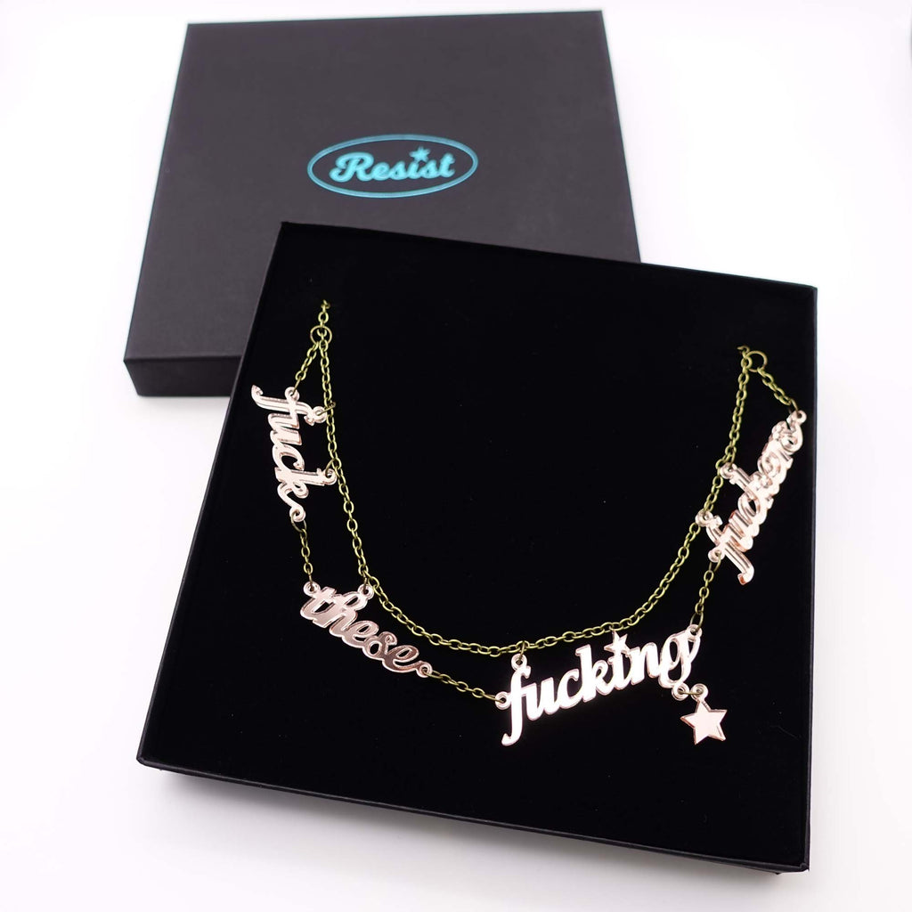 Rose gold mirror fuck these fucking fuckers necklace shown in large gift box