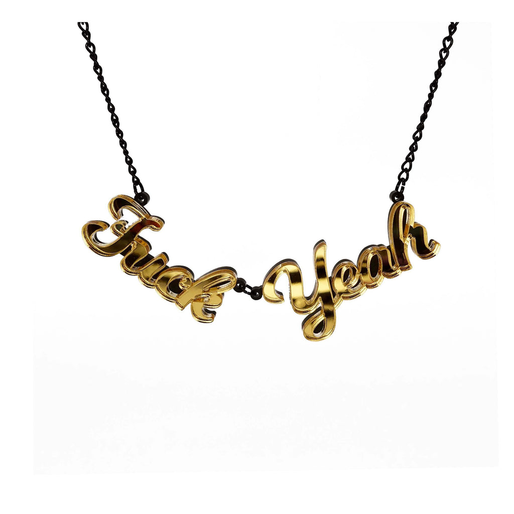 Gold mirror F*ck Yeah necklace shown hanging on white. Designed by Sarah Day for Wear and Resist. £2 goes to Bloody Good Period. 