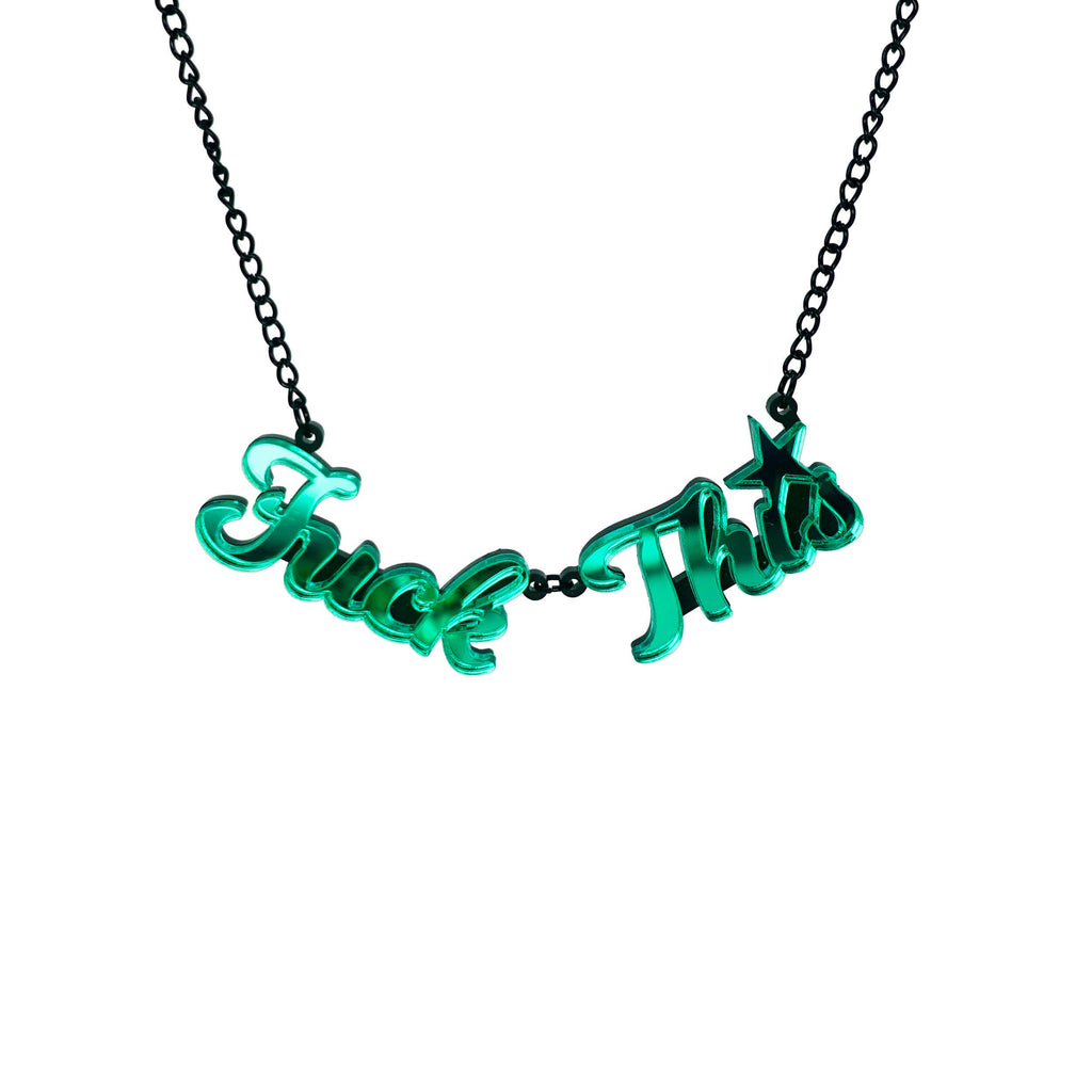 An electric green mirror F*ck This necklace shown hanging against a white background. Designed by Sarah Day for Wear and Resist. £2 goes to Bloody Good Period. 