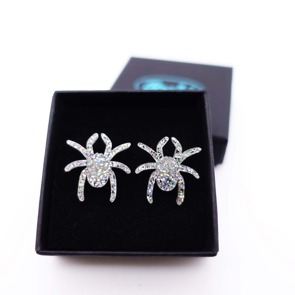 holographic silver glitter Lady Hale spider studs in a Wear and Resist gift box. 