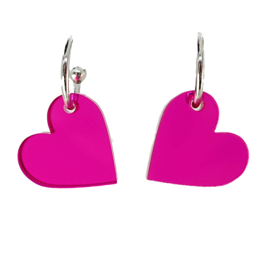 Transparent hot pink simple heart hoop earrings. 