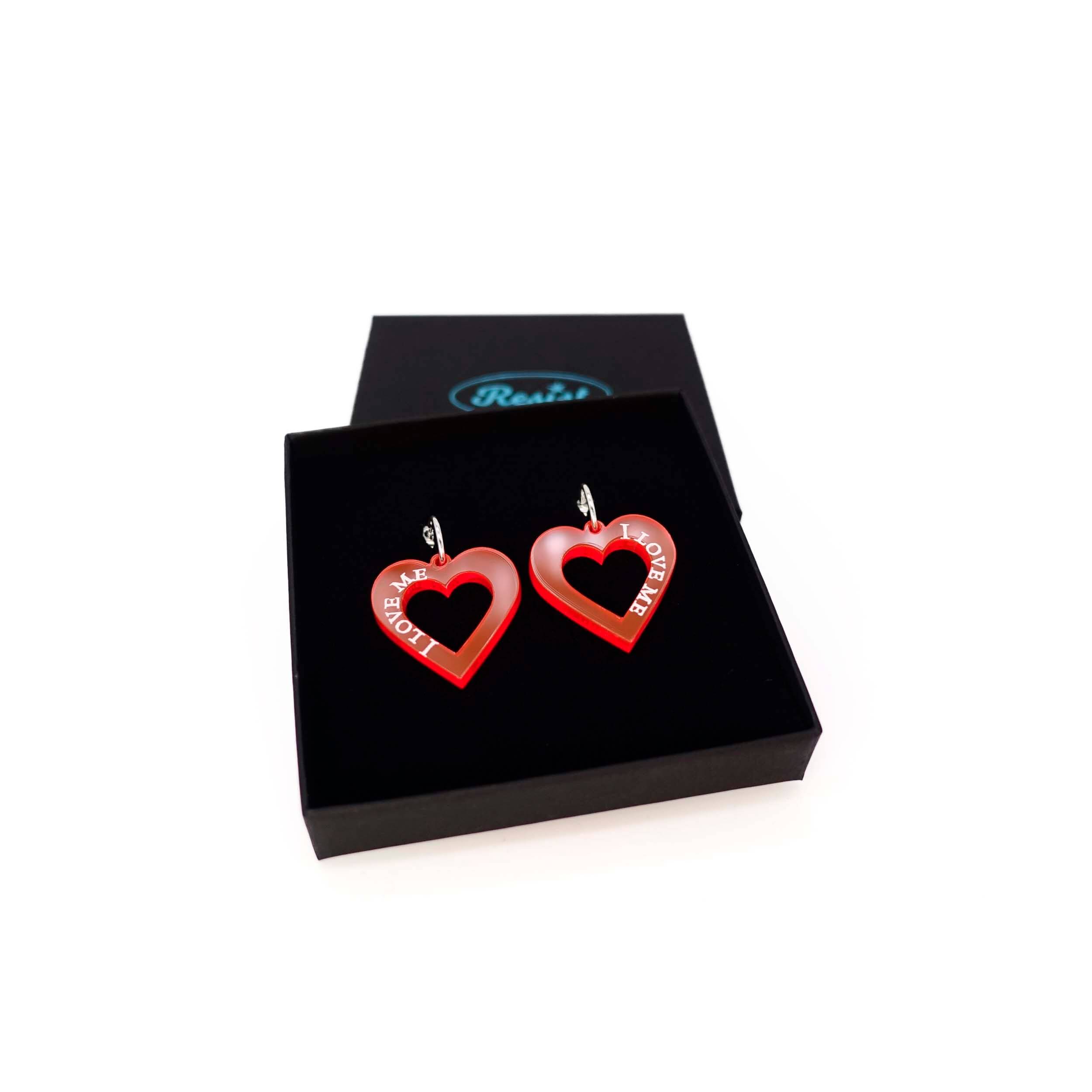 Hot red I love me heart hoops shown in a Wear and Resist gift box. 