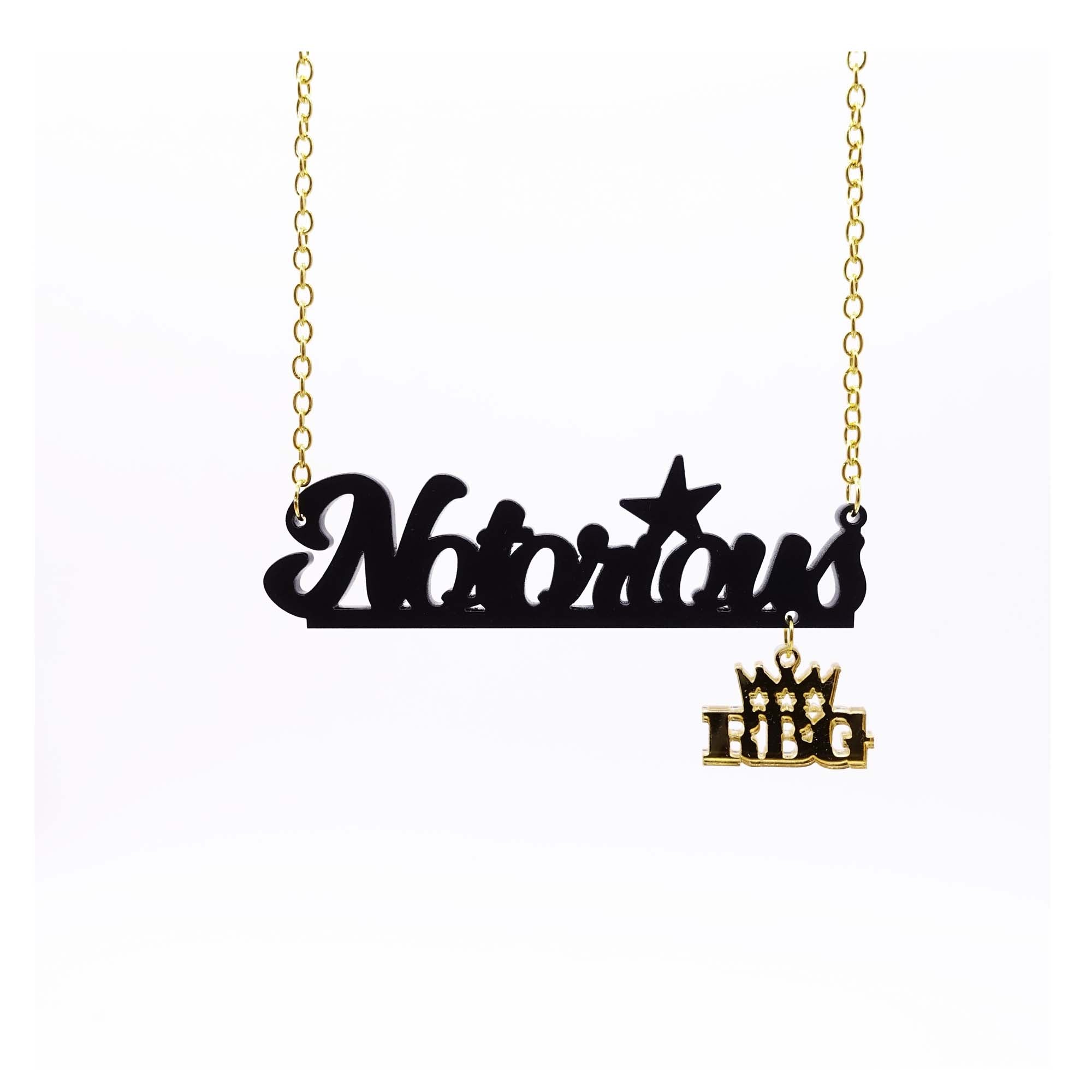 Notorious RBG necklace in matte black and gold in honour of Ruth Bader Ginsburg