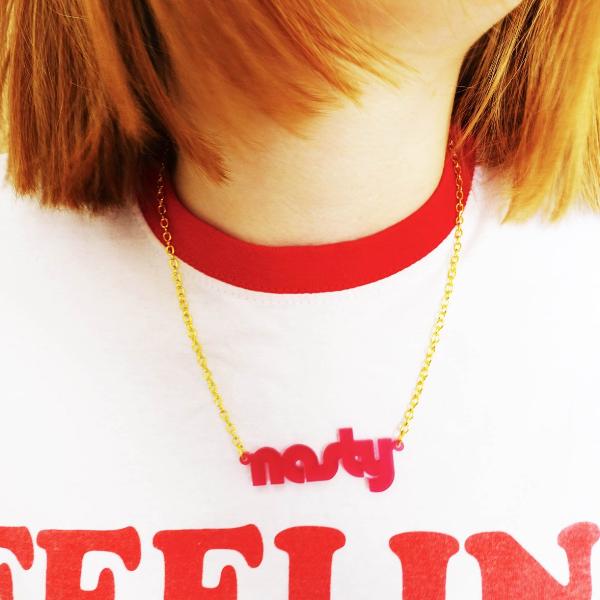model wears chilli red frost retro disco nasty necklace for nasty women