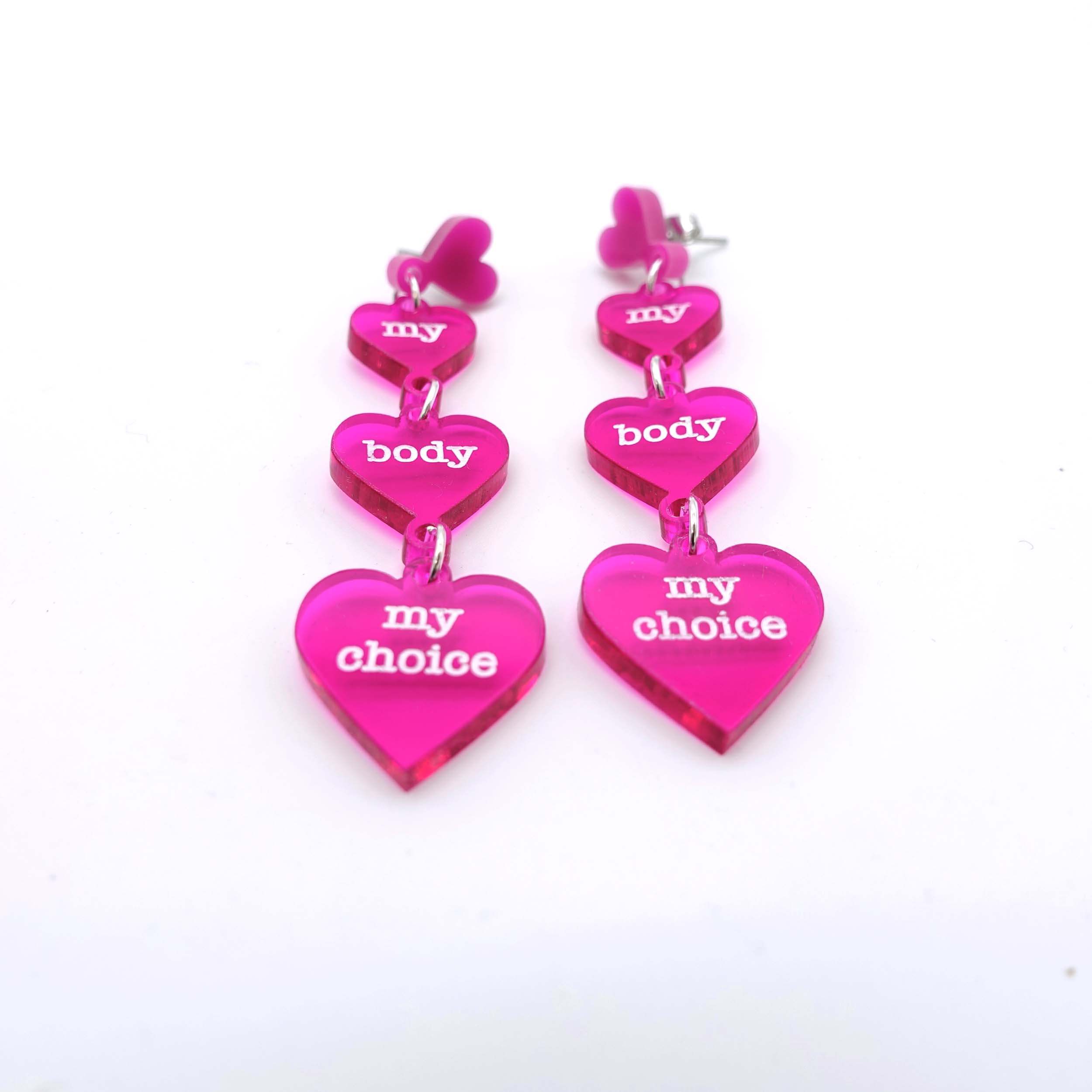 My body my choice heart drop earrings designed by Sarah Day for Wear and Resist. 