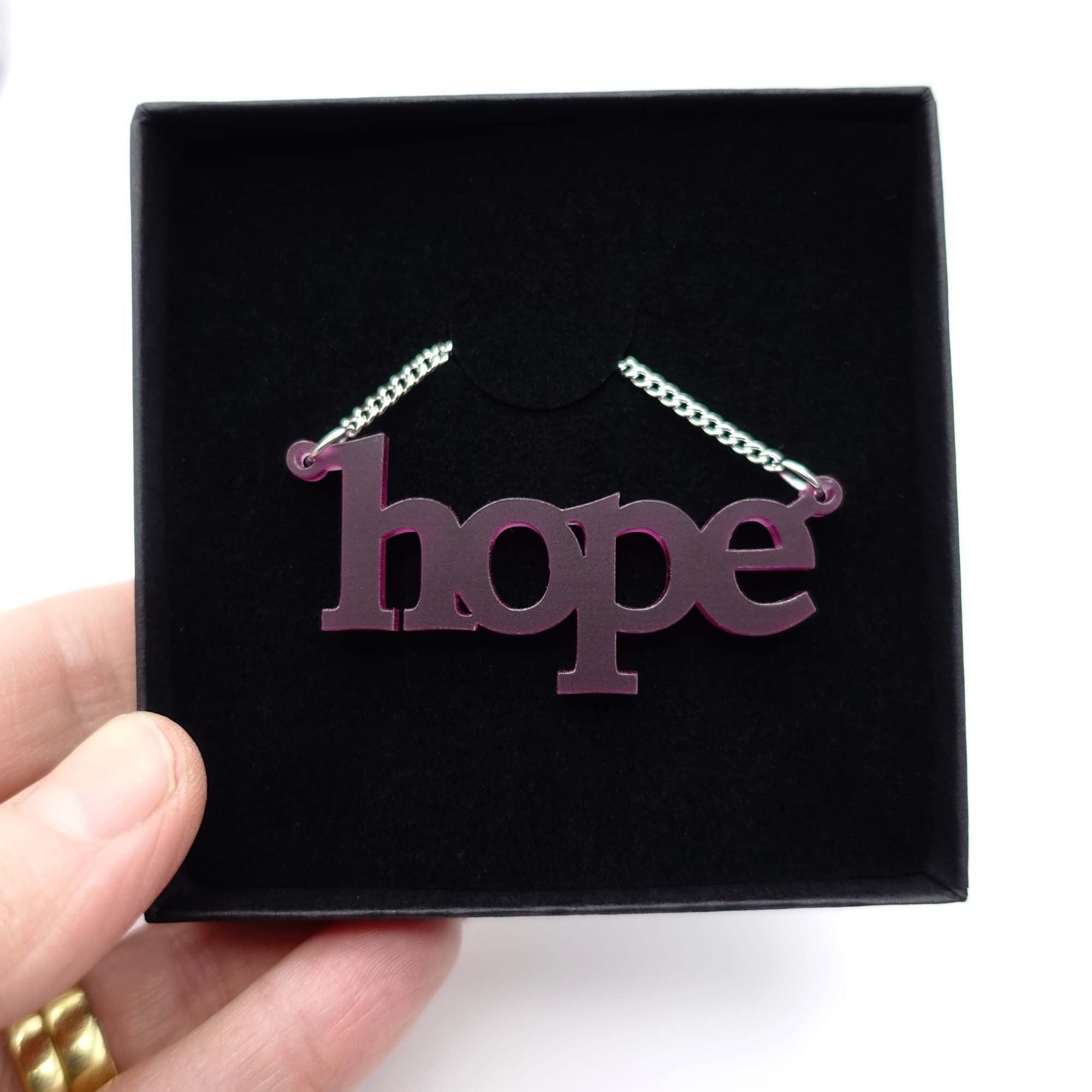 Plum frost Hope necklace shown in gift box. 