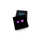 Poison purple mirror mirror tiny heart stud earrings shown in a Wear and Resist gift box. 