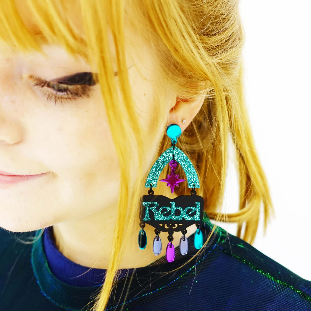 Model wears Rebel Rebel statement earrings