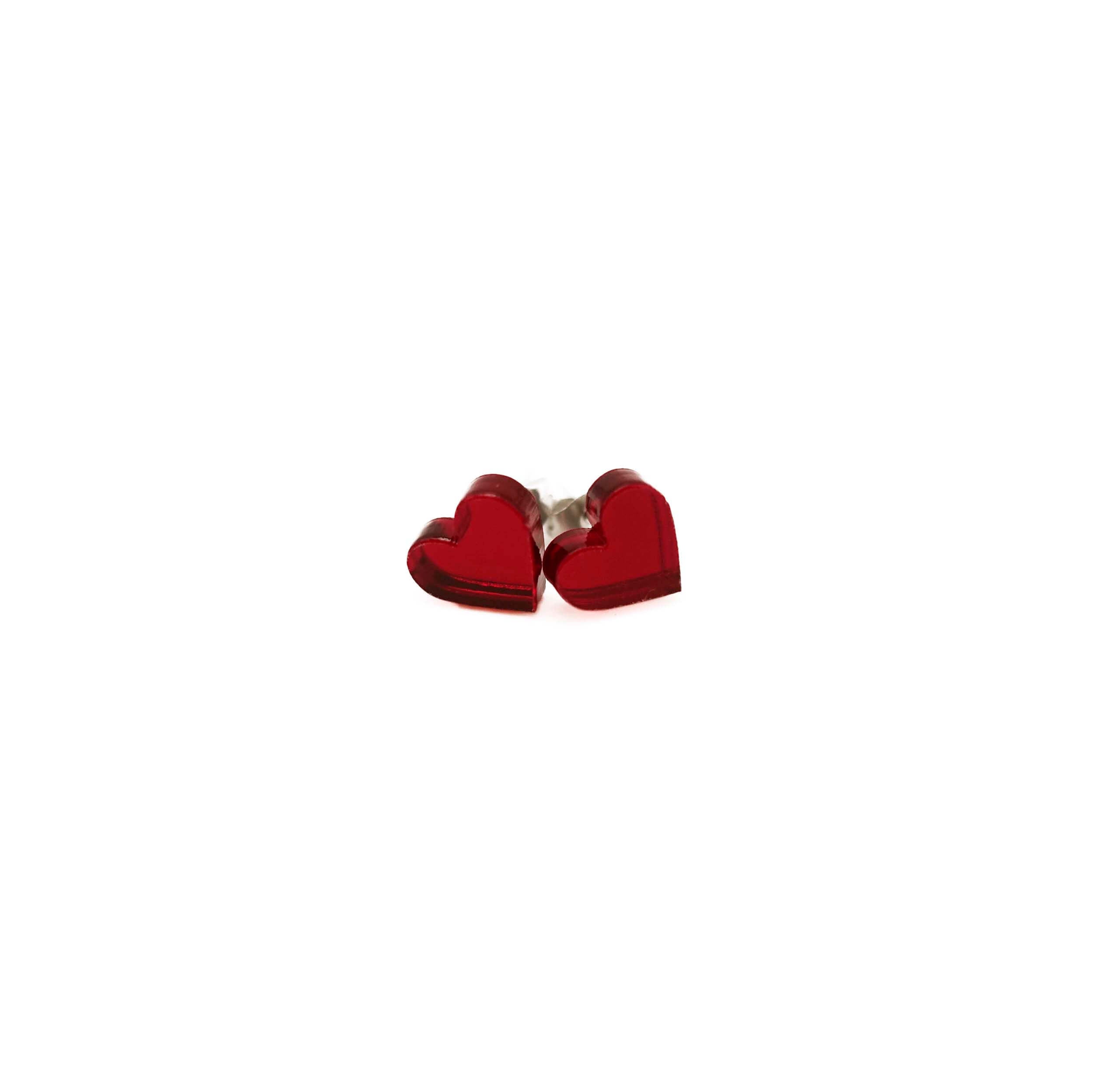 Crimson red mirror tiny heart stud earrings shown on a white background. 