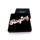 Rose-galled Raging necklace shown in a Wear and Resist gift box. 