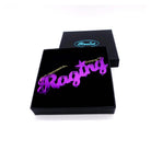 Royally pissed off purple Raging necklace shown in a Wear and Resist gift box. 
