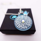 Close up of Sagittarius Astrology Zodiac Starsign necklace on box