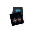 Shero heart earring hoops engraved with gold lettering. Designed by Sarah Day for Wear and Resist. Shown in a small gift box. 