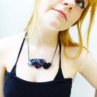 Model wears slate mirror  feminist KILLJOY necklace 