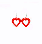 Hot red love heart small hoop earrings shown on a white backround. £2 goes to the DEC Turkey and Syria Earthquake Appeal. 