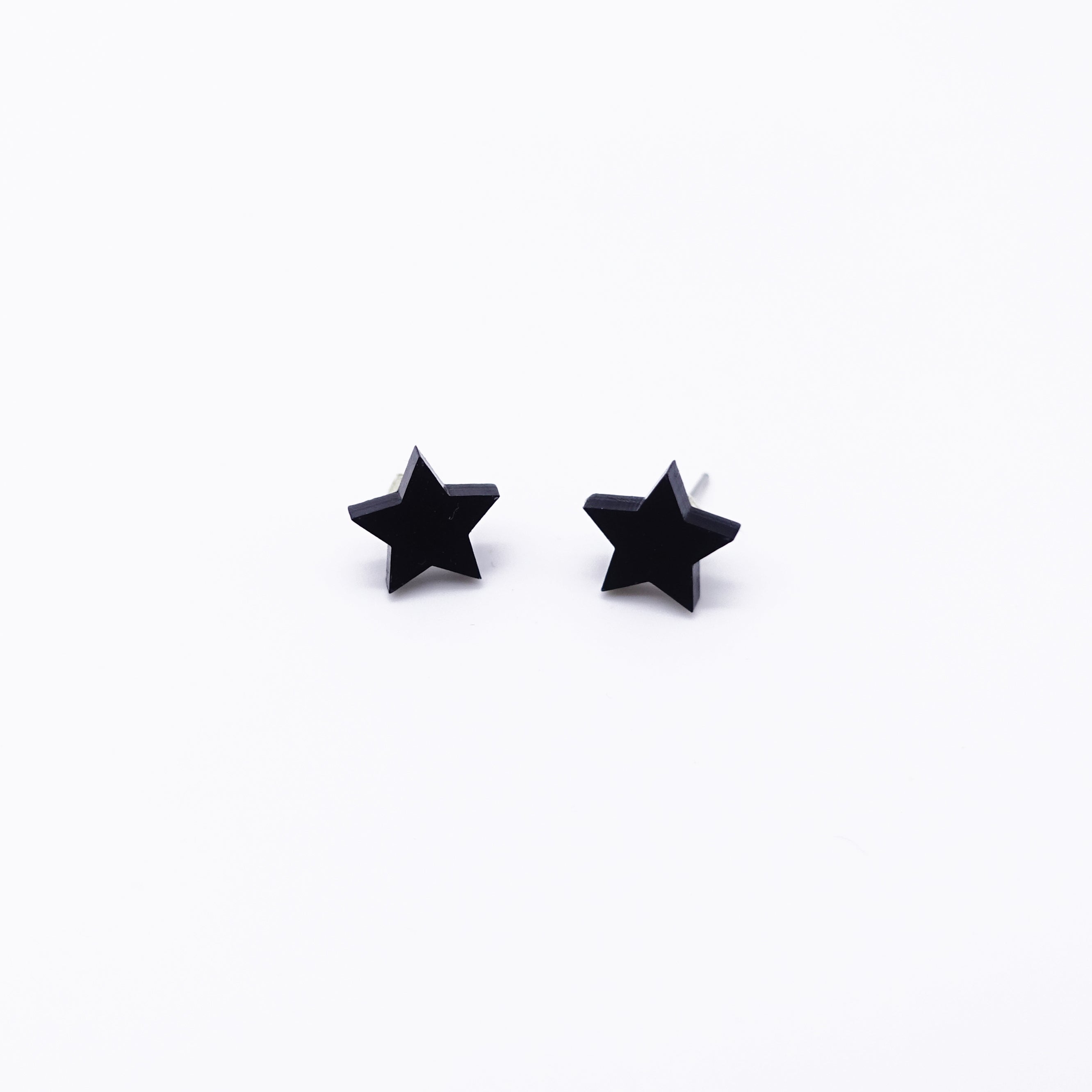 matte black small star earrings